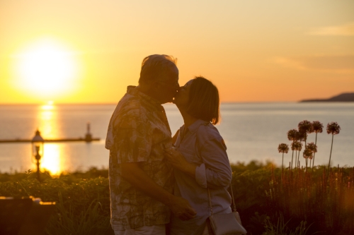 Petoskey sunset two people kissing