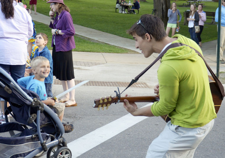 Summer open house kid with guitar and smiling kid