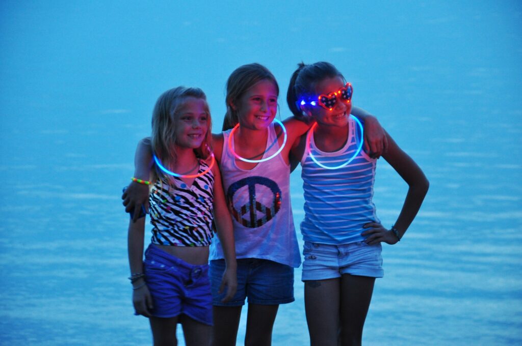 Girls welcoming summer fun near Little Traverse Bay
